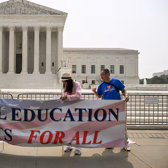 Activists from Students for Fair Admissions celebrate the affirmative action opinion outside the U.S. Supreme Court in Washington, June 29, 2023. The group that successfully sued Harvard to end affirmative action in university admissions last year is now threatening to investigate whether schools are complying with the new rules and to file lawsuits if it believes that they are not. (Kenny Holston/The New York Times)