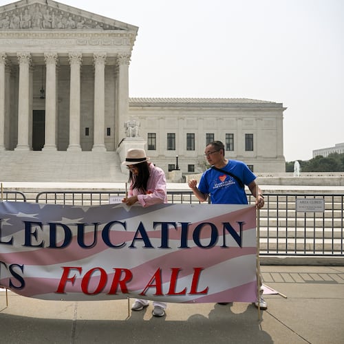 Activists from Students for Fair Admissions celebrate the affirmative action opinion outside the U.S. Supreme Court in Washington, June 29, 2023. The group that successfully sued Harvard to end affirmative action in university admissions last year is now threatening to investigate whether schools are complying with the new rules and to file lawsuits if it believes that they are not. (Kenny Holston/The New York Times)