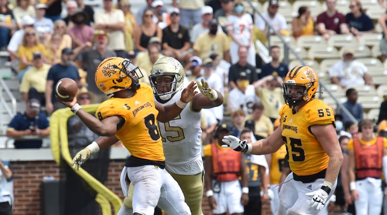 September 11, 2021 Atlanta - Kennesaw State's quarterback Xavier Shepherd (8) gets tackled by Georgia Tech's defensive lineman Jared Ivey (15) as he gets off a pass during the second half of an NCAA college football game at Georgia Tech's Bobby Dodd Stadium in Atlanta on Saturday, September 11, 2021. Georgia Tech won 45-17 over Kennesaw State. (Hyosub Shin / Hyosub.Shin@ajc.com)
