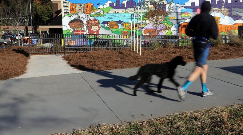The Kroger on Ponce De Leon Avenue, nicknamed ‘Murder Kroger’, recently added a mural, an access ramp to the Beltline, bike racks and a bicycle repair station. A Kroger spokesman said they would prefer to be known as ‘Beltline Kroger.’ BEN GRAY / BGRAY@AJC.COM
