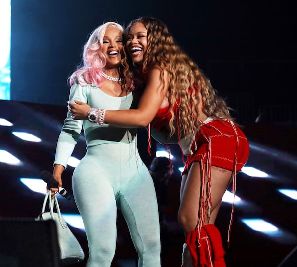 Cardi B (left) and Latto were among the artists were featured in the Hot 107.9 Birthday Bash ATL. The sold-out concert took place Saturday, June 17, 2023 at State Farm Arena. (Robb Cohen for the AJC)