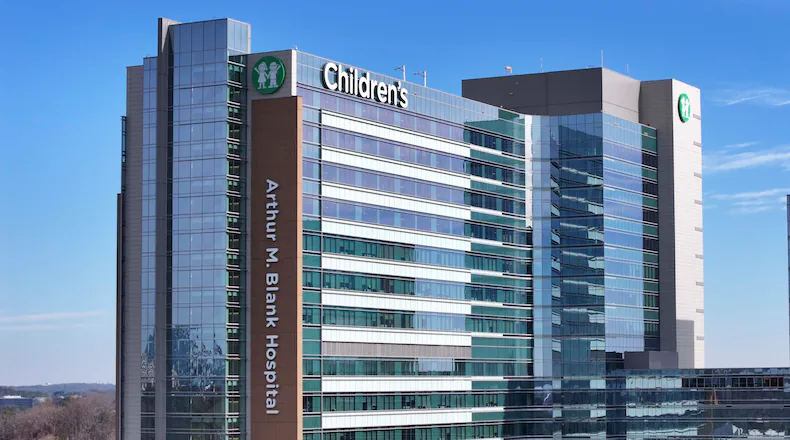 An aerial image shows part of the Children’s Healthcare of Atlanta Arthur M. Blank Hospital building on Thursday, Dec. 11, 2025. A man convicted of laundering $5.3 million stolen from Children's was sentenced to four years in federal prison, prosecutors announced this week. (Miguel Martinez/ AJC)