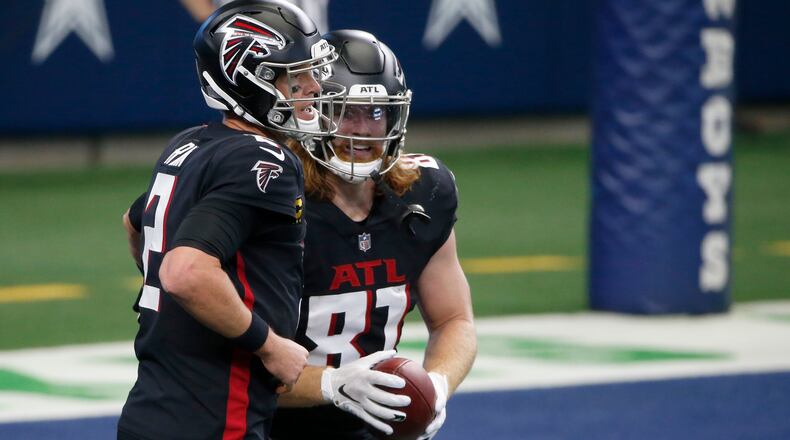 Falcons quarterback Matt Ryan (2) celebrated touchdown pass to tight end Hayden Hurst (81) in the first half against the Dallas Cowboys Sunday, Sept. 20, 2020, in Arlington, Texas. (Michael Ainsworth/AP)