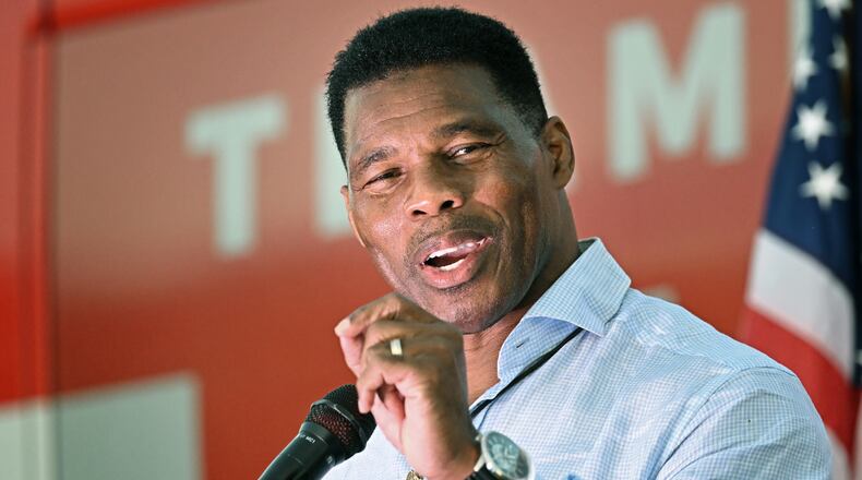 November 3, 2022 Smyrna - Republican U.S. Senate hopeful Herschel Walker speaks during a rally in Smyrna as a part of the Unite Georgia Bus Tour on Thursday, November 3, 2022. (Hyosub Shin / Hyosub.Shin@ajc.com)