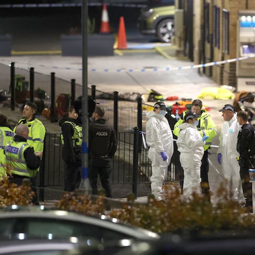 Emergency responders at Huntingdon station after a mass stabbing on a London-bound train in eastern England, in Cambridgeshire, England, Saturday, Nov. 1, 2025. (Chris Radburn/PA via AP)