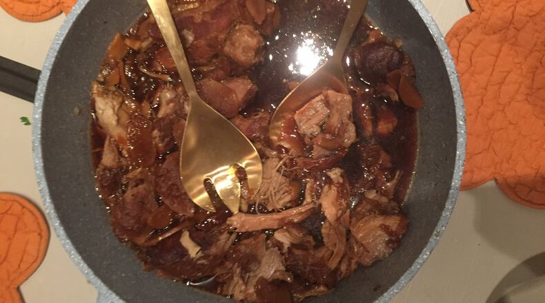 The hunt for a Boston butt among butcher shops in Israel ends with a finished dish of Japanese-style pork, braised with soy sauce, mirin, ginger and onions. CONTRIBUTED BY JOHN KESSLER