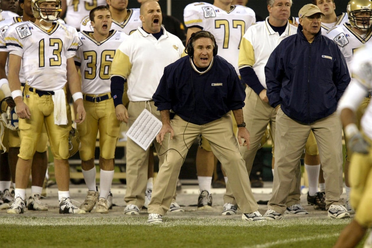 Mac McWhorter (center) was offensive line coach for Georgia Tech from 2000-01, overseeing Brent Key. He was also a coach at UGA from 1991-95, where he recruited Kirby Smart out of high school. (Jim Bates/The Seattle Times)