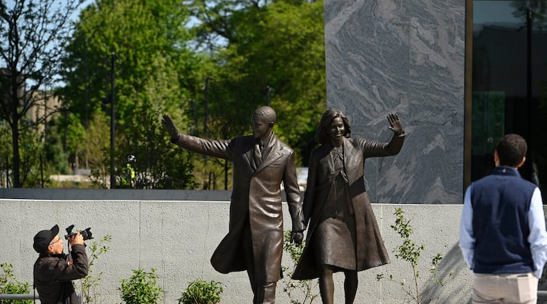 Statues of former President Barack Obama and former First Lady Michelle Obama at the Obama Presidential Center in Chicago, Thursday, May 28, 2026. (AP Photo/Paul Beaty)