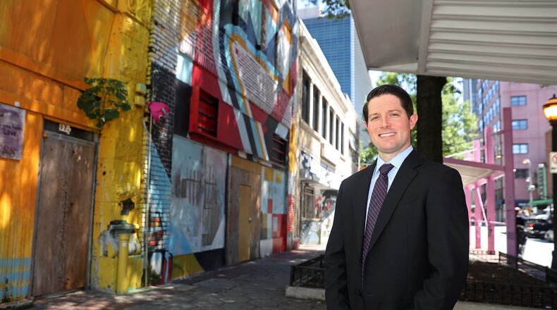 Jake Nawrocki, President of Newport US RE, is shown next to buildings Newport US has purchased on Broad Street on Monday, June 26, 2016, in Atlanta, Ga. PHOTO / JASON GETZ