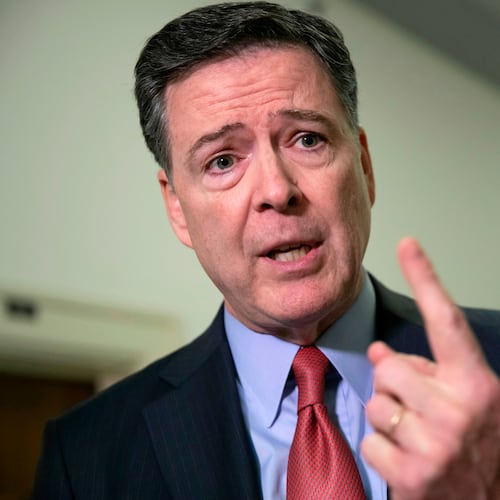 FILE - Former FBI Director James Comey speaks to reporters on Capitol Hill in Washington, Dec. 17, 2018. (AP Photo/J. Scott Applewhite, File)