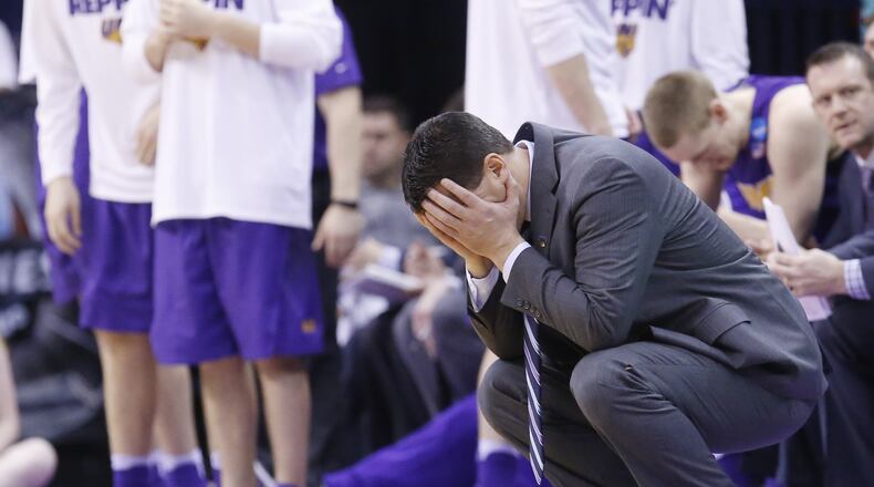 Northern Iowa head coach Ben Jacobson covers his face with his hands in the second half of a second-round men's college basketball game against =Texas A&M in the NCAA Tournament Sunday, March 20, 2016, in Oklahoma City. Texas A&M won 92-88 in double overtime. (AP Photo/Sue Ogrocki)