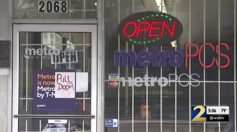 Two armed men robbed this Metro PCS store in East Point over the weekend, police said.