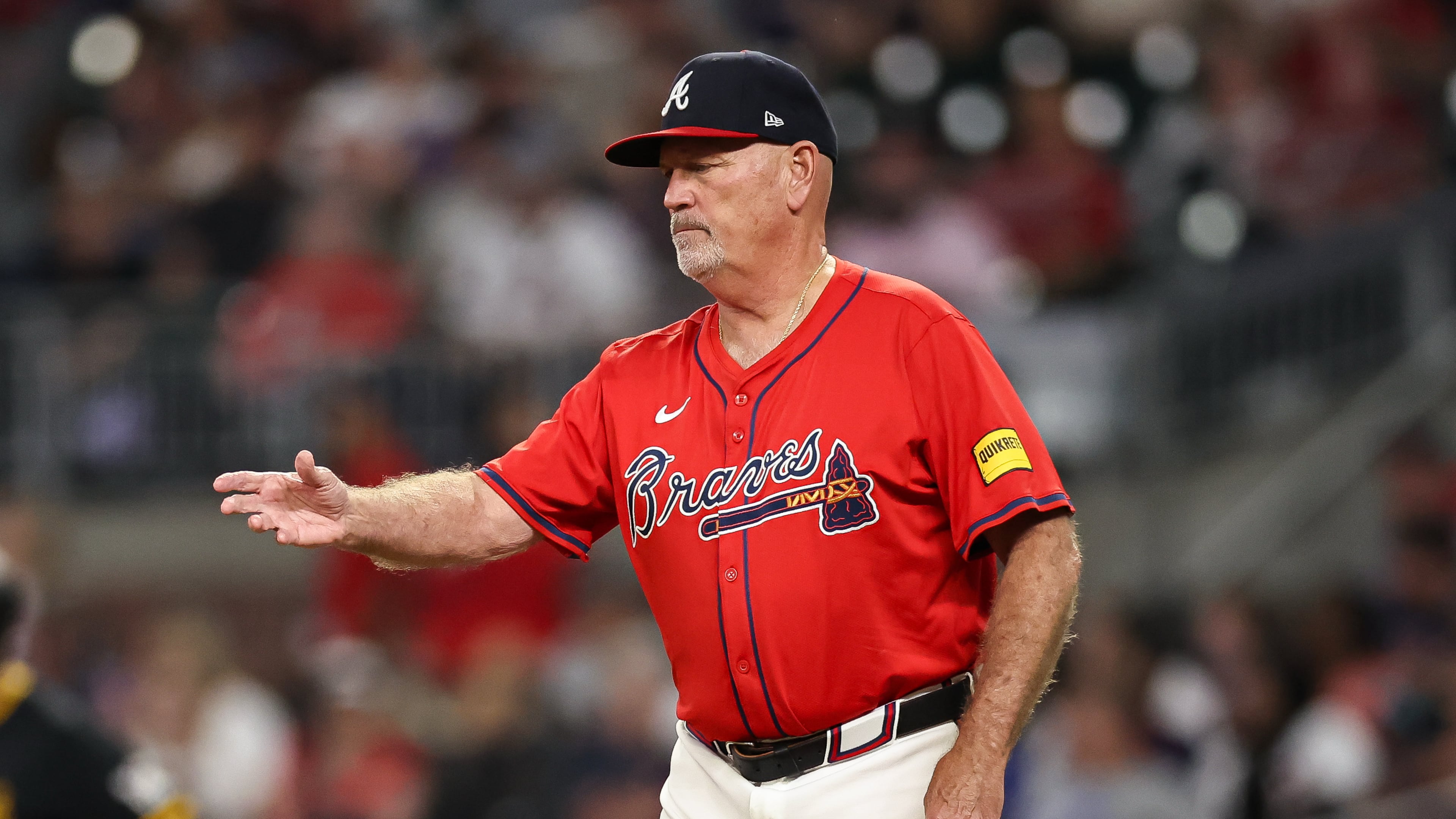 Atlanta Braves manager Brian Snitker walks to the mound to make a pitching change in the fifth inning of a baseball game against the Pittsburgh Pirates, Friday, Sept. 26, 2025, in Atlanta. (AP Photo/Colin Hubbard)