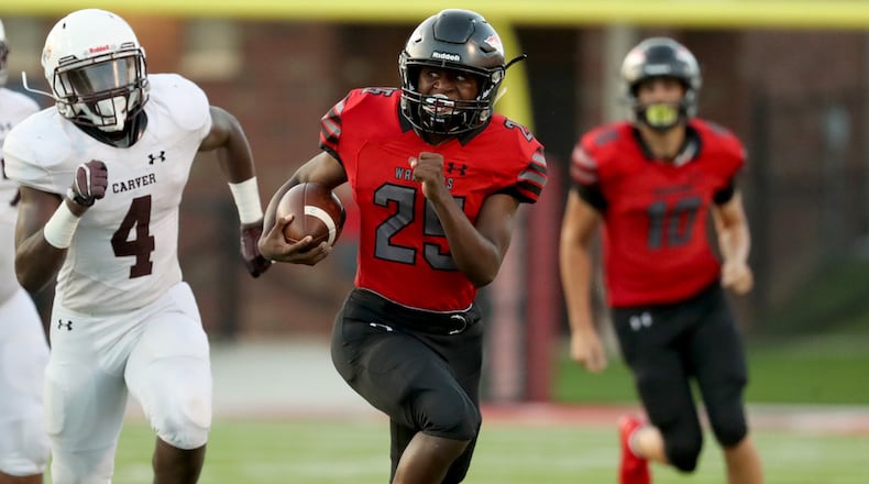 Sept. 2, 2020 - Canton, Ga: Cherokee running back Zi Johnson (25) runs for yards in the third quarter against Carver-Atlanta at Cherokee high school Wednesday, September 2, 2020 in Canton, Ga.. JASON GETZ FOR THE ATLANTA JOURNAL-CONSTITUTION