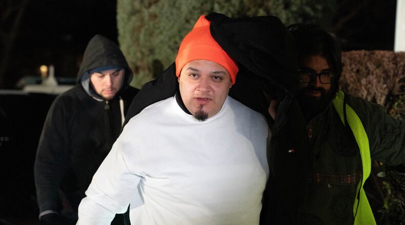 Kilmar Abrego García arrives to his home in Beltsville, Md., Thursday, Dec. 11, 2025, after being released from ICE custody. (AP Photo/Jose Luis Magana)