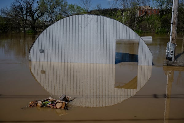 A flooded structure is seen on Monday, April 7, 2025, in Frankfort, Ky. (AP Photo/Jon Cherry)