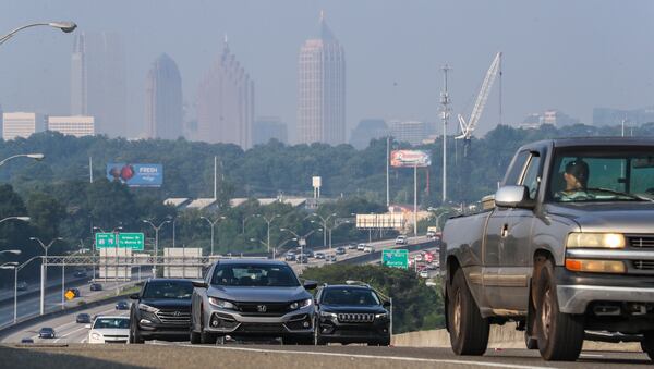 Motorists make their way onto GA 400 northbound. (John Spink/AJC)