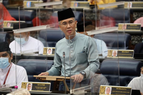 FILE - Malaysia's Finance Minister Zafrul Aziz delivers the 2021 budget speech at parliament in Kuala Lumpur, Malaysia, Nov. 6, 2020. (AP Photo/Vincent Thian, File)