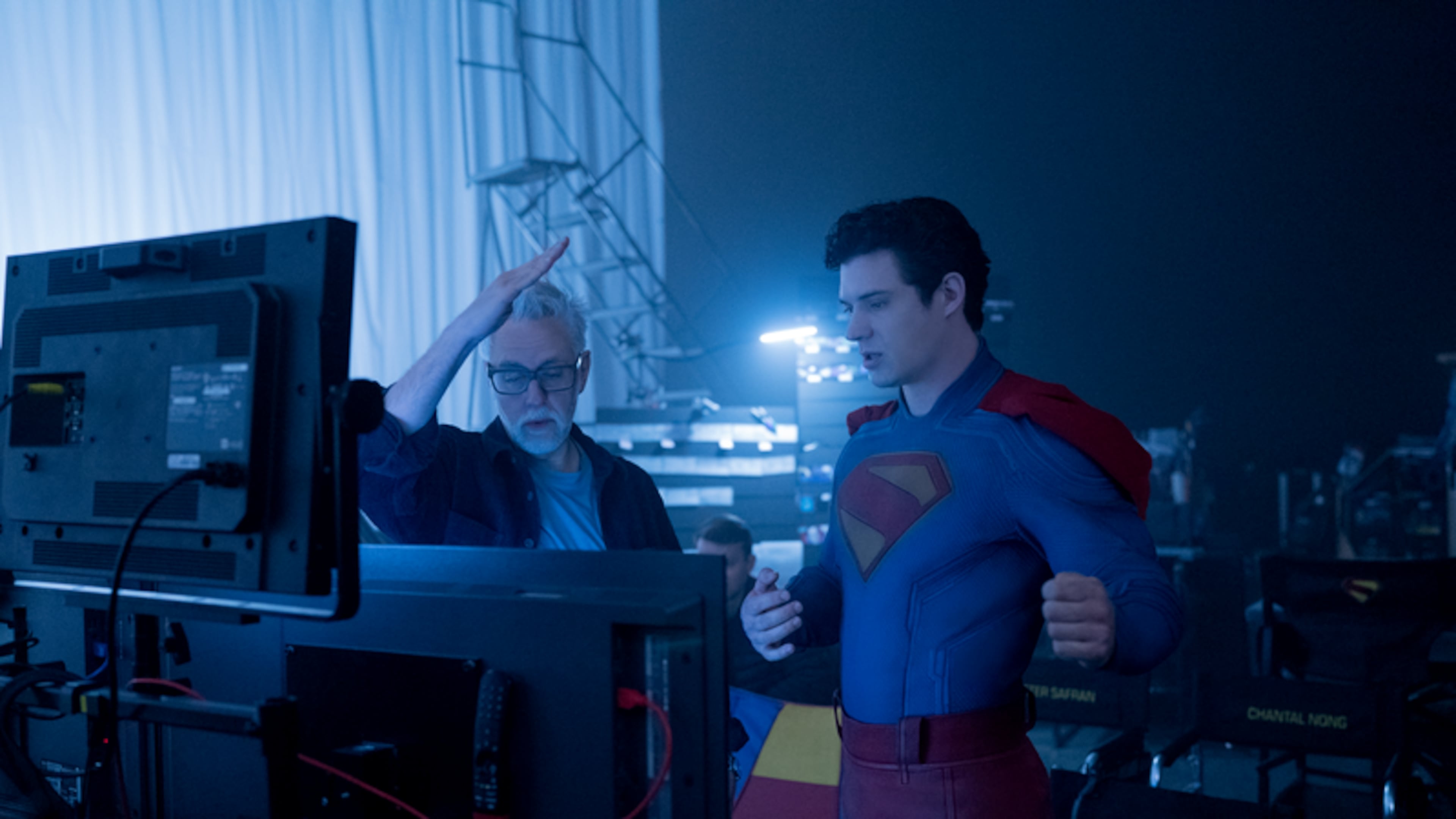 DC Studios co-CEO and "Superman" director James Gunn (left) works with David Corenswet during the filming of the movie, set to be released on Thursday, July 10, 2025. (Courtesy of Warner Brothers)