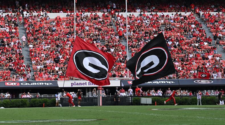 Georgia fans react after Georgia tight end Lawson Luckie (7) scored touchdown during the second half in an NCAA football game at Sanford Stadium, Saturday, September 9, 2024, in Athens. Georgia won 48-3 over Tennessee Tech. (Hyosub Shin / AJC)