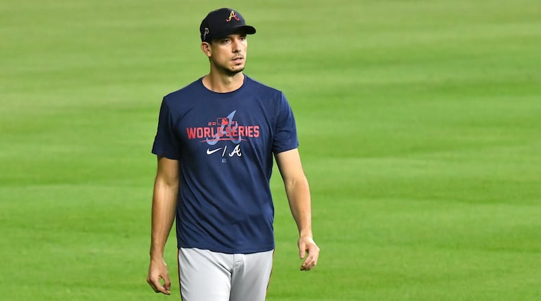 Braves starting pitcher Charlie Morton (50) walks on the field during workout in preparation for Game 1 of baseball's World Series against Houston Astros at Minute Maid Park in Houston on Monday, October 25, 2021. (Hyosub Shin / Hyosub.Shin@ajc.com)
