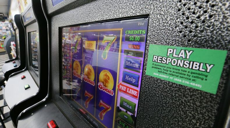 Georgia ventures like Hariz USA, Lucky Latin Games and Nickle Pumper, as well as convenience stores and billiard parlors, lease gambling devices like this from companies the state calls master licensees. Those license holders are guaranteed an equal split of profits with game operators, and the Legislature this year capped the number of master licensees to little more than the existing small group. BOB ANDRES / BANDRES@AJC.COM