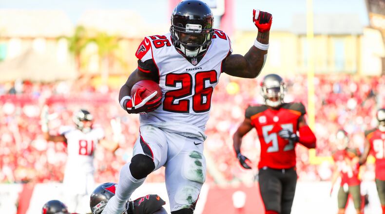 TAMPA, FL - DECEMBER 30: Running back Tevin Coleman #26 of the Atlanta Falcons high steps into the end zone to score in the third quarter of the game at Raymond James Stadium on December 30, 2018 in Tampa, Florida. (Photo by Will Vragovic/Getty Images)