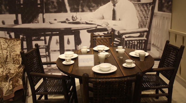 China setting and furniture on display at the FDR Memorial Museum, part of Roosevelt's Little White House state historic site in Warm Springs, Ga. The china on display is Royal Copenhagen of Denmark. New York Gov. Franklin D. Roosevelt used these pieces while he stayed at his first cottage in Warm Springs known today as the McCarthy Cottage. credit: Holly Steel / hsteel@ajc.com