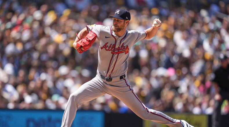 Atlanta Braves pitcher Chris Sale works against a San Diego Padres batter during the first inning of an opening-day baseball game Thursday, March 27, 2025, in San Diego. (AP Photo/Gregory Bull)