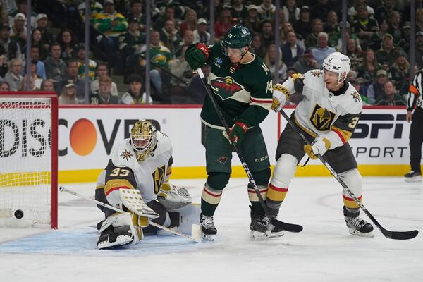 Vegas Golden Knights goaltender Adin Hill (33) gives up a goal to Minnesota Wild left wing Kirill Kaprizov (not shown) during the first period of Game 3 of a first-round NHL hockey playoff series Thursday, April 24, 2025, in St. Paul, Minn. (AP Photo/Abbie Parr)