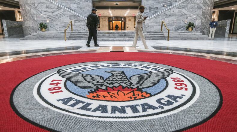 March 23, 2018 Atlanta: Employees at Atlanta City Hall were handed instructions as they come through the front doors to not turn on computers or log on to their workstations on Friday March 23, 2018. Friday's action comes as city officials are struggling to determine how much sensitive information may have been compromised in a Thursday cyber attack. The city has also received demands that it pay a ransom of an unspecified amount, officials confirmed. But officials had yet to make a determination if it would pay the ransom. Hartsfield-Jackson International took down the wi-fi at the world's busiest airport after a cyber attack on the city. The Atlanta airport's website said after the cyber attack that security wait times and flight information may not be accurate. JOHN SPINK/JSPINK@AJC.COM