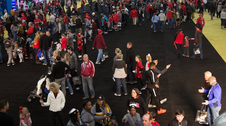 A large crowd gathers in the Georgia World Congress Center for  Playoff Fan Central on Jan. 6.