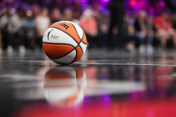 A WNBA basketball is shown on the court during a break in play in the WNBA game between the Atlanta Dream and the Minnesota Lynx at the Gateway Center Arena, Friday, June 27, 2025, in College Park, Ga. (Jason Getz/AJC)