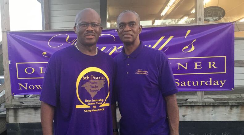 Michael Murrell (right) and his uncle, Victor Bruinton.