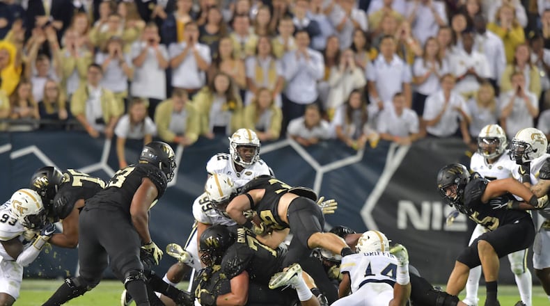 October 21, 2017 Atlanta - Wake Forest running back Cade Carney (36) is stopped by Georgia Tech defense in the second half of an NCAA college football game at Bobby Dodd Stadium on Saturday, October 21, 2017. Georgia Tech beat Wake Forest 38-24. HYOSUB SHIN / HSHIN@AJC.COM
