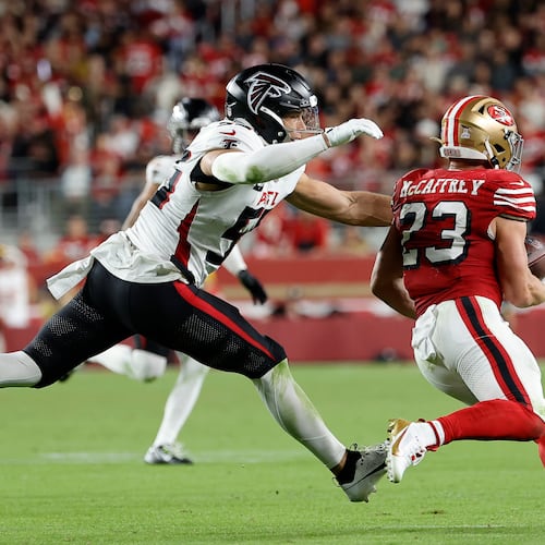 San Francisco 49ers running back Christian McCaffrey had over 200 yards of total offense in a 20-10 win over the Atlanta Falcons, who saw their two-game winning streak snapped. (Kelley L Cox/AP)