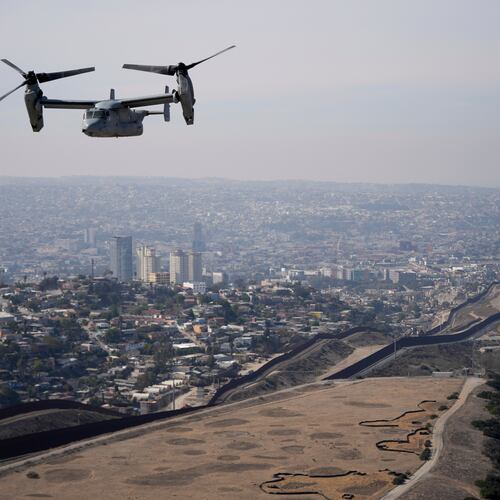 A U.S. Marine Osprey is flown over the border, Jan. 31, 2025, near San Diego. (AP Photo/Jae C. Hong, File)