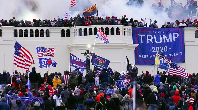 FILE - Rioters storm the West Front of the U.S. Capitol Jan. 6, 2021, in Washington. (AP Photo/John Minchillo, File)