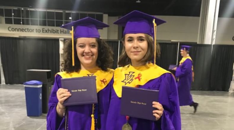 Adrina Bradley (right) and her best friend, Abigail Stigall, after Lakeside High School’s graduation Tuesday at the Georgia World Congress Center. (Photo courtesy of Adrina Bradley)