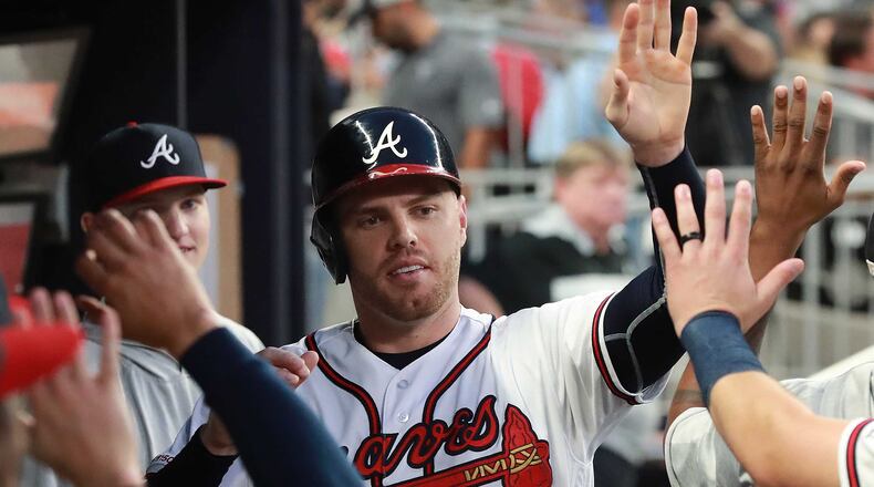Braves slugger Freddie Freeman and his wife, Chelsea, donated to the Atlanta Community Food Bank, the Giving Kitchen and The Salvation Army.