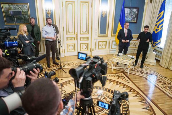 Ukrainian President Volodymyr Zelenskyy, right, and German Defence Minister Boris Pistorius attend a news conference during their meeting in Kyiv, Ukraine, on Thursday, June 12, 2025. (AP Photo/Evgeniy Maloletka)