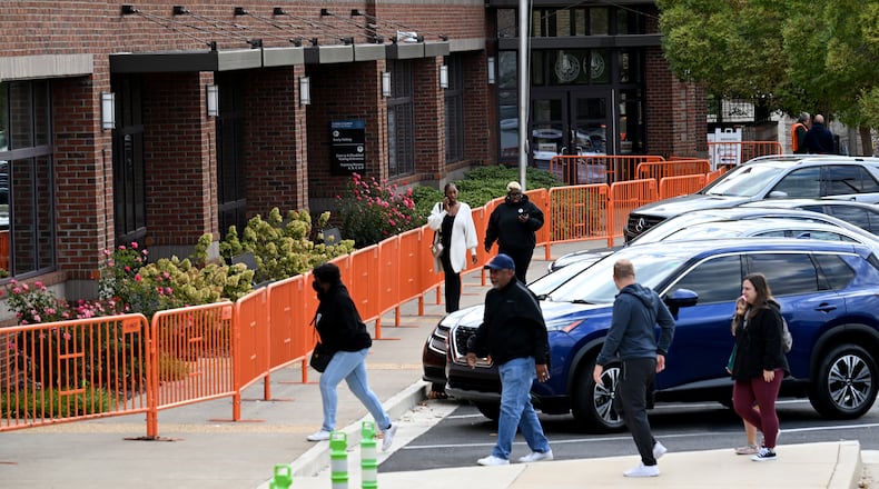 People arrive for early voting at Cobb County Elections and Registration Main Office in Marietta on Oct. 15.