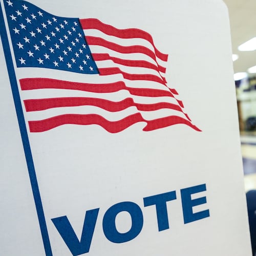 A person votes in the Virginia redistricting referendum at Lake Braddock Secondary School, Tuesday, April 21, 2026, in Burke, Va. (AP Photo/Julia Demaree Nikhinson)