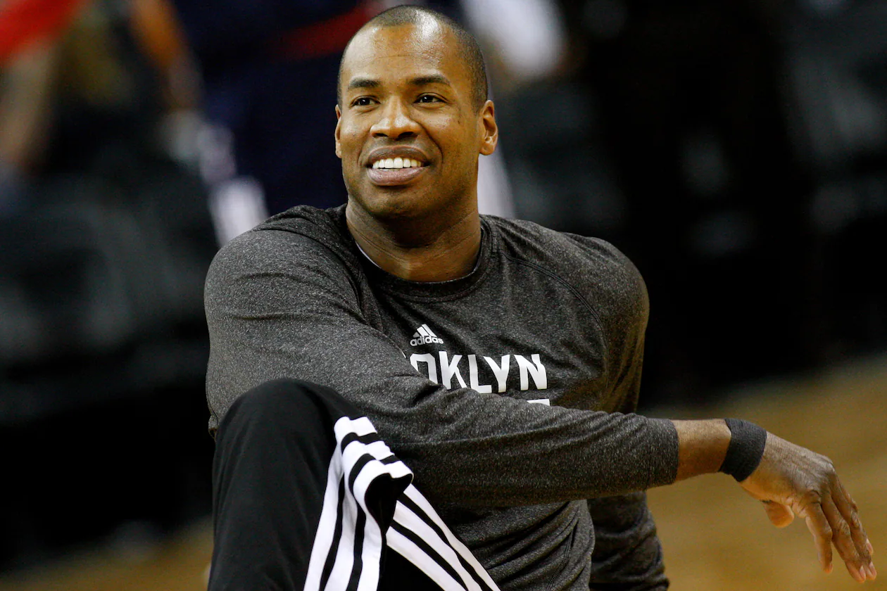 Former NBA center Jason Collins warms up before a basketball game in New Orleans, March 24, 2014. (Jonathan Bachman/AP File)