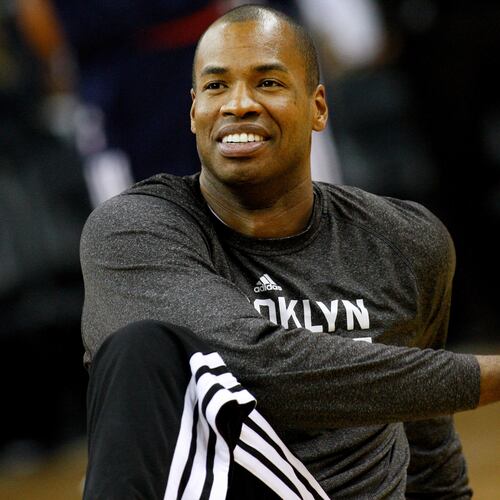 FILE - Brooklyn Nets center Jason Collins warms up before an NBA basketball game in New Orleans, March 24, 2014. (AP Photo/Jonathan Bachman, File)
