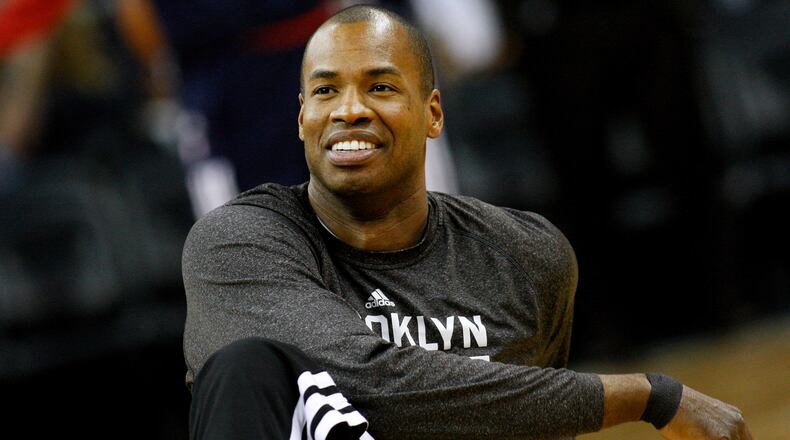 Former NBA center Jason Collins warms up before a basketball game in New Orleans, March 24, 2014. (Jonathan Bachman/AP File)