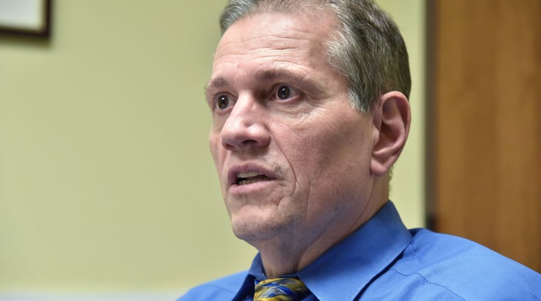 LaGrange Police Chief Lou Dekmar took the helm of the International Association of Chiefs of Police Tuesday. Dekmar called on law enforcement officials to acknowledge past wrongs to promote community trust. HYOSUB SHIN / HSHIN@AJC.COM