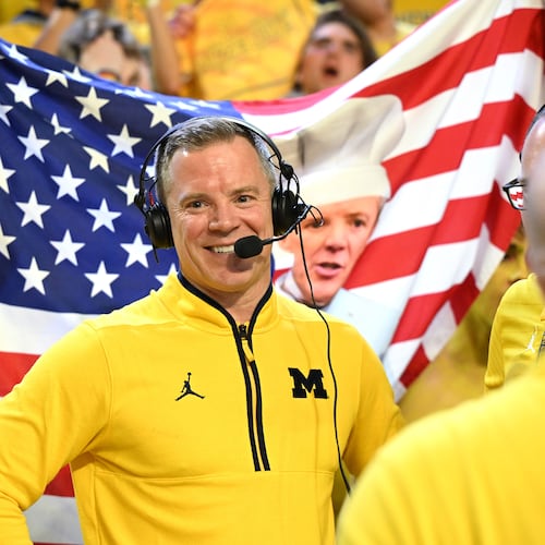 FILE - Michigan head coach Dusty May talks with the media following their a win over Michigan State after an NCAA college basketball game in Ann Arbor, Mich., March 8, 2026. (AP Photo/Lon Horwedel, file)