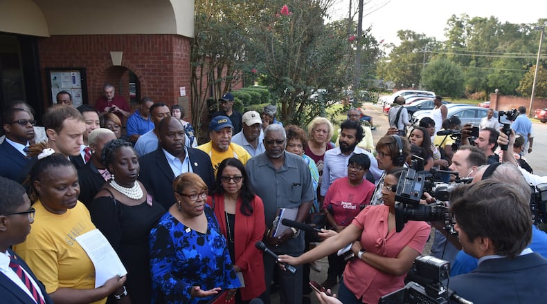 August 24, 2018 Cuthbert - Voting rights advocates including Helen Butler with Georgia Coalition for the People’s Agenda speak to members of the press outside Randolph County Government Center after Randolph County Board of Elections defeated a contentious proposal to close seven rural voting locations on Friday, August 24, 2018. The Randolph County Board of Elections voted 2-0 to save these precincts and preserve easy access to the polls for about 1,700 registered voters. HYOSUB SHIN / HSHIN@AJC.COM