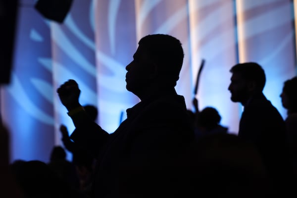 Convention attendees cheer at the Savannah Convention Center in Savannah on Saturday, Aug. 1, 2026. (Arvin Temkar/AJC)
